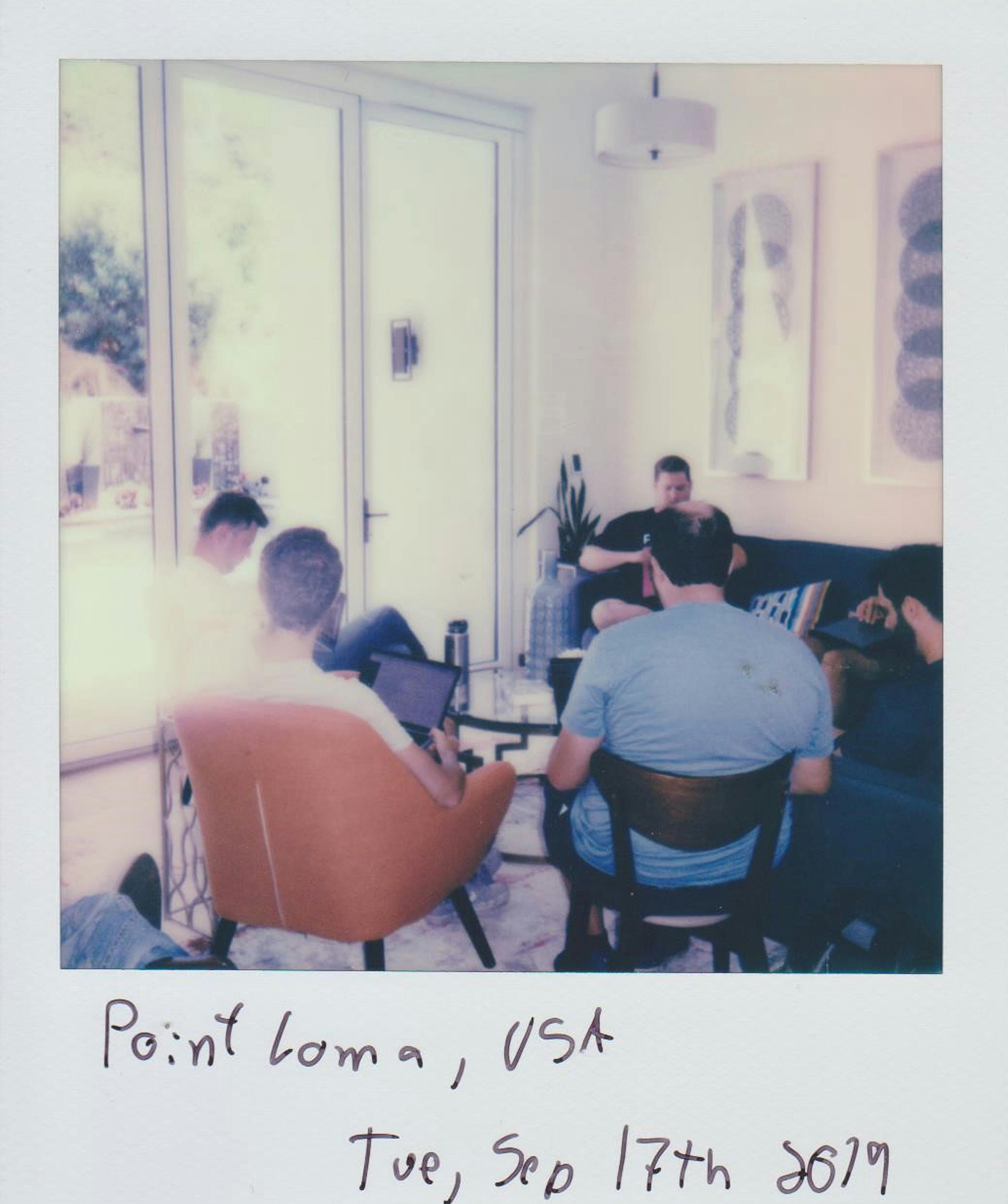 Polaroid-style photo of a casual meeting in Point Loma, capturing a retro vibe.