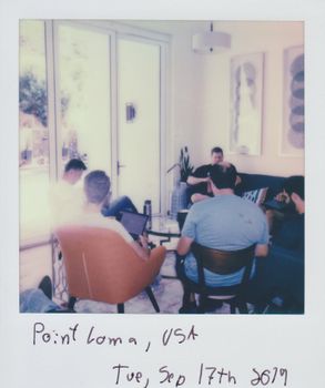 Polaroid-style photo of a casual meeting in Point Loma, capturing a retro vibe.