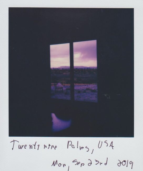 A nostalgic instant photo capturing a dusk view from Twentynine Palms, USA.