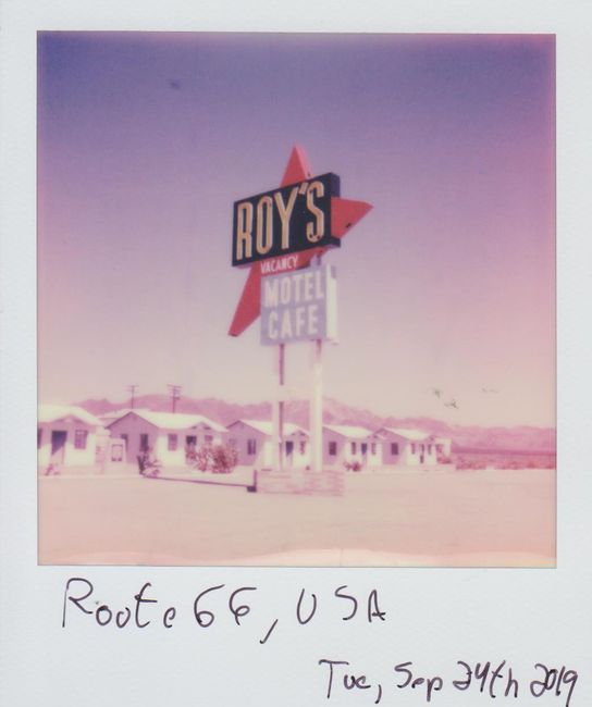 Retro Polaroid shot of Roy's Motel and Cafe, a classic stop on Route 66 in the USA.