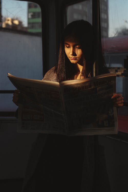 Free Woman Reading Newspaper Stock Photo