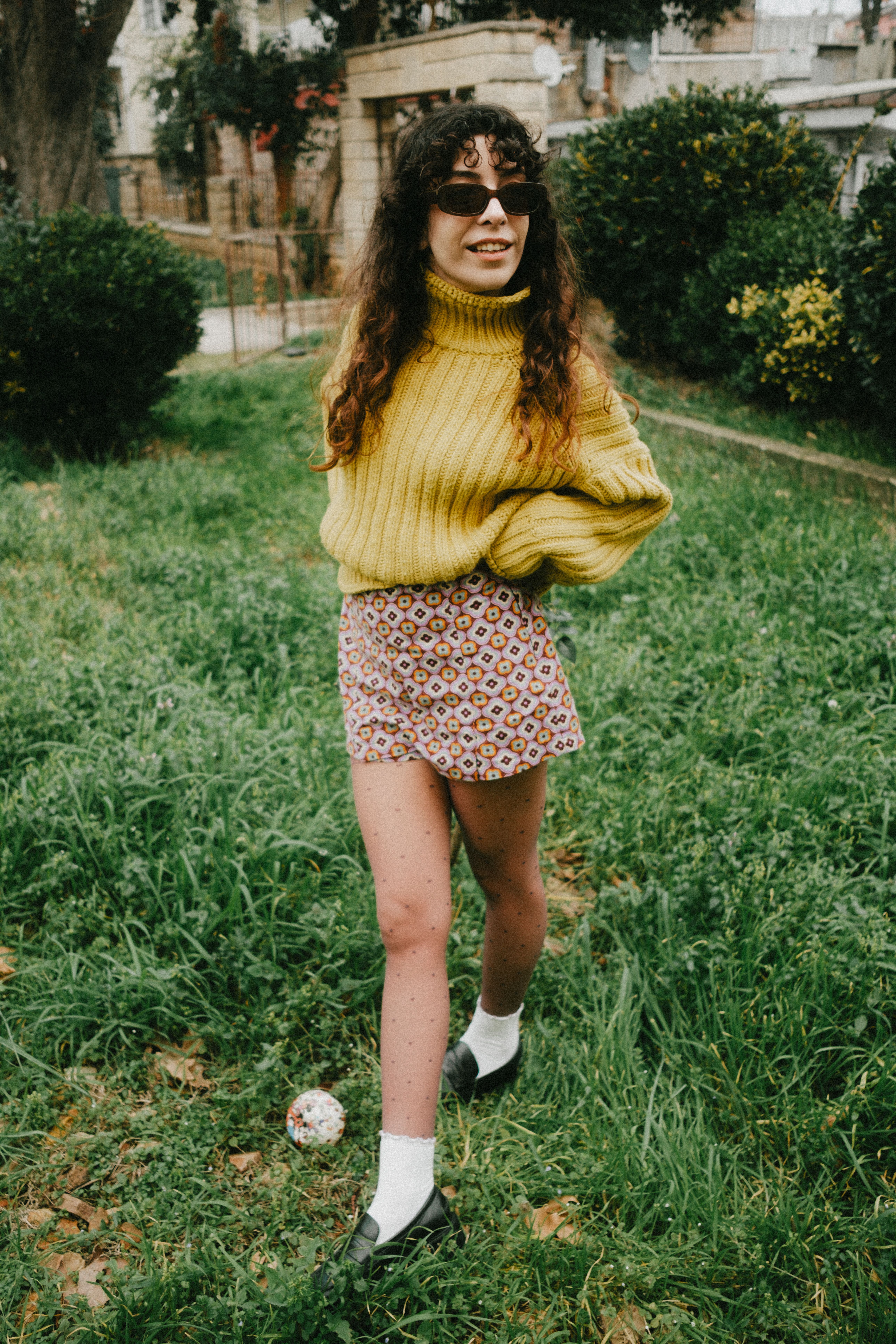 Fashionable Woman in Urban Park Setting · Free Stock Photo