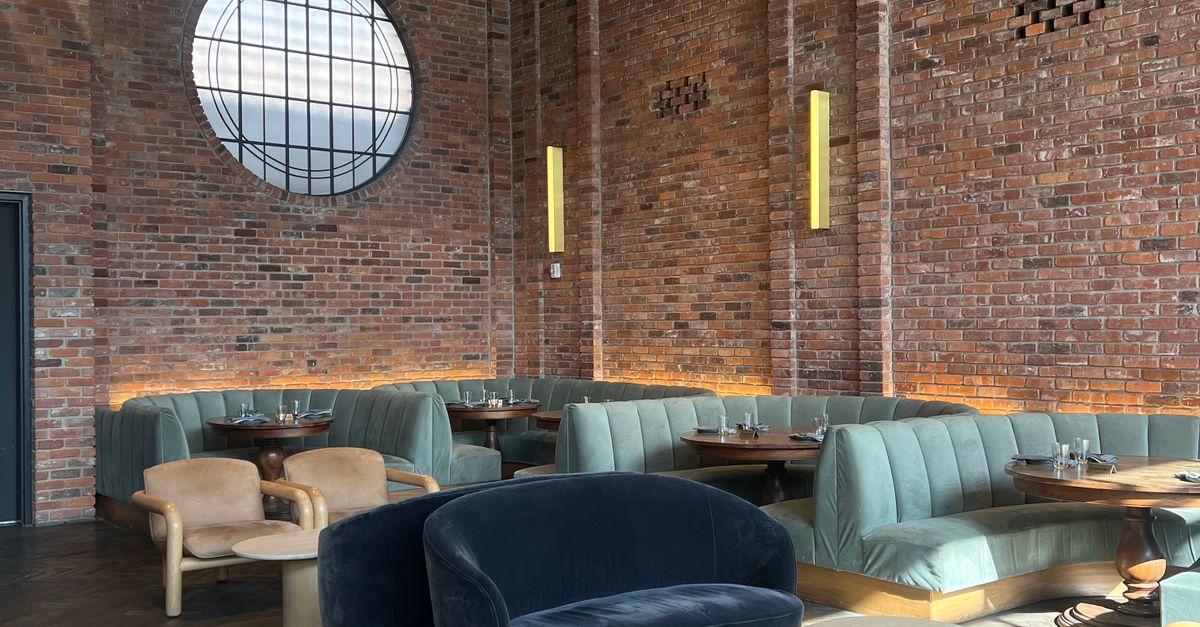 Chic Industrial Loft Restaurant Interior Design · Free Stock Photo
