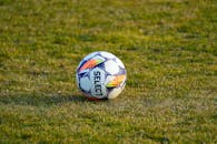 Soccer Ball on Grass Field in Daylight