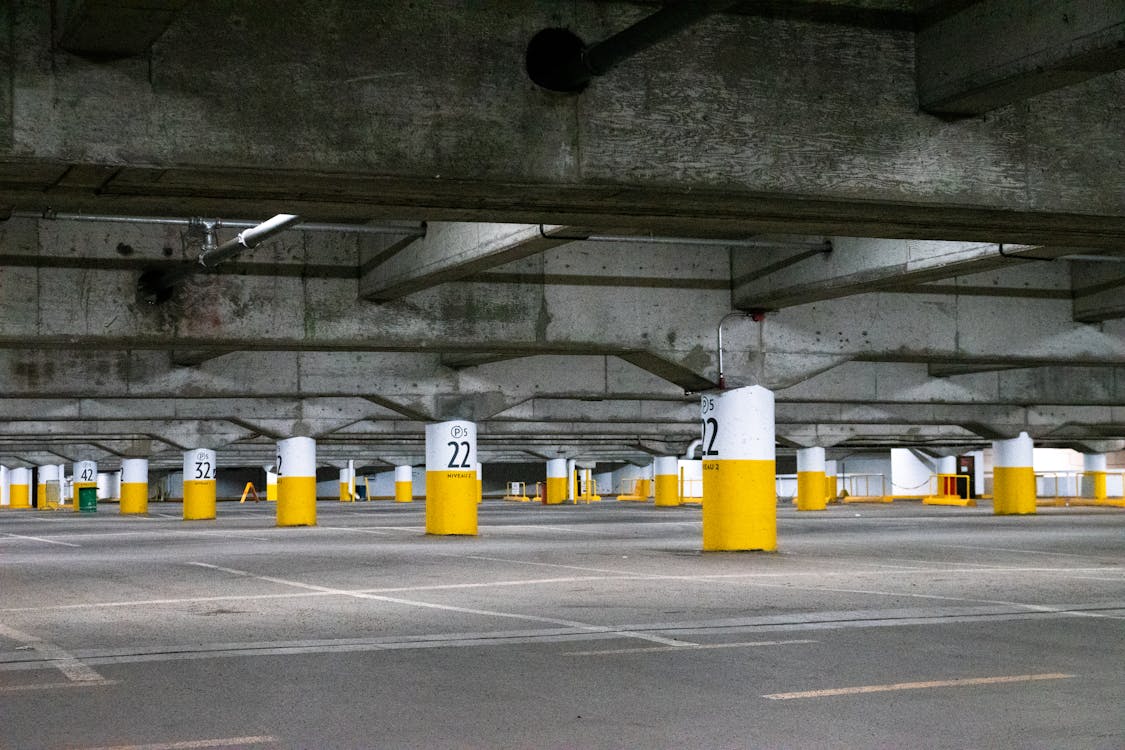 Free Empty Concrete Parking Lot Stock Photo