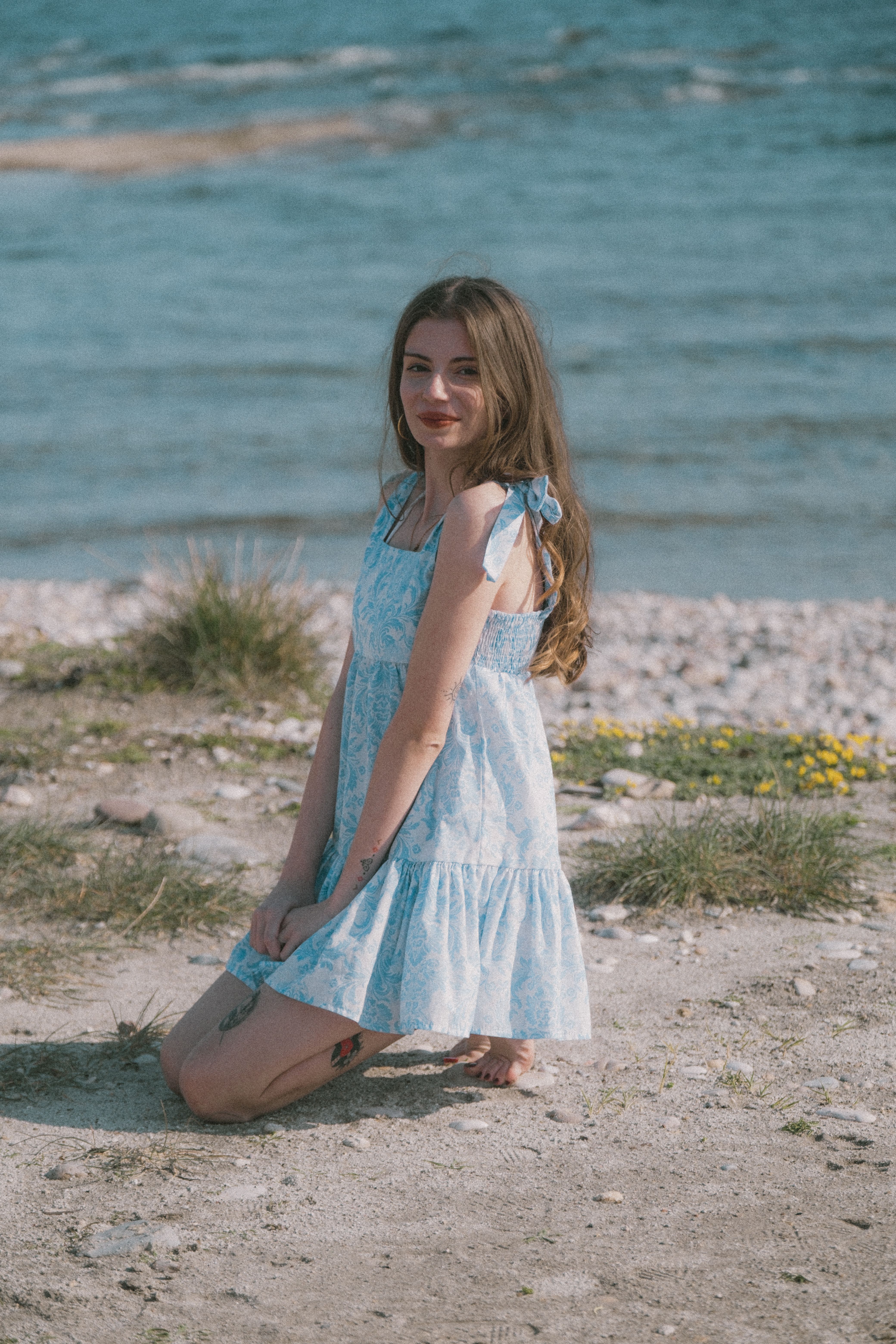 Young Woman in Blue Dress by the Sea · Free Stock Photo