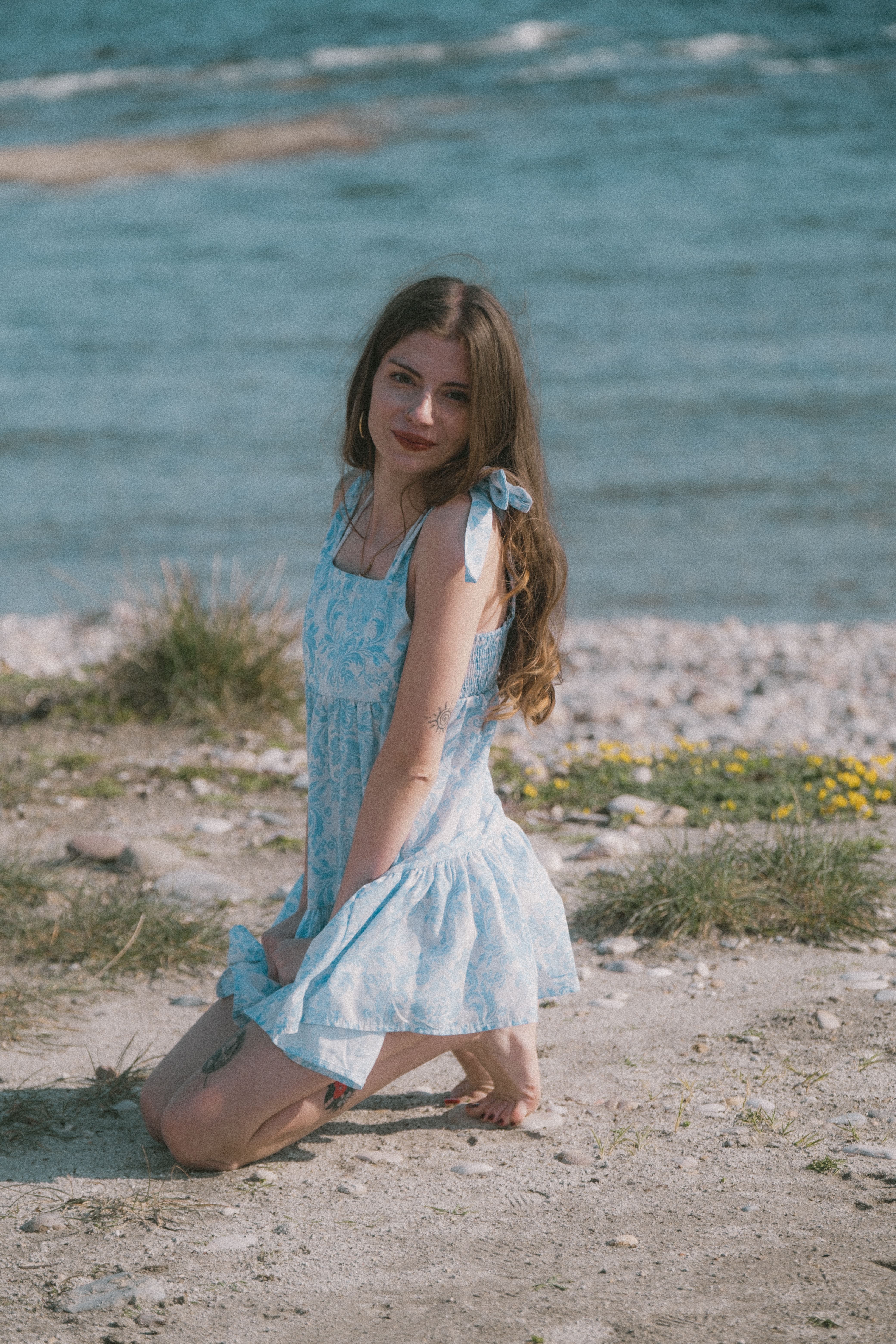 Young Woman in Blue Dress by the Sea · Free Stock Photo