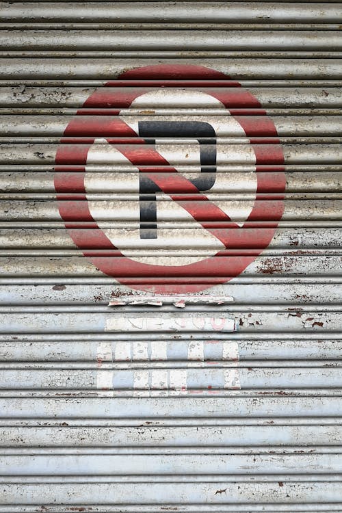 Photo of No Parking Sign on Roller Shutter