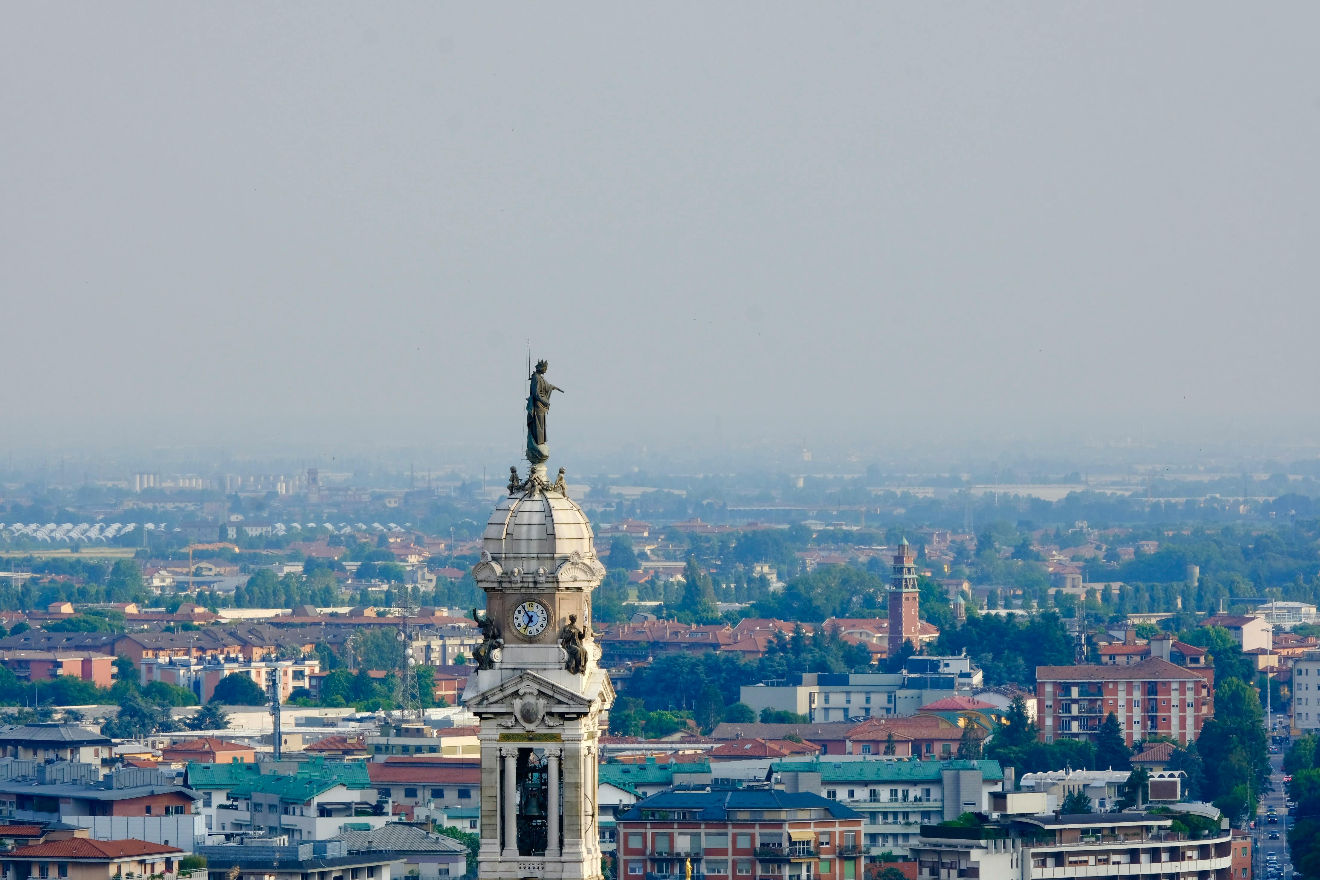 A stunning view of Bergamo showcasing a prominent tower against the city