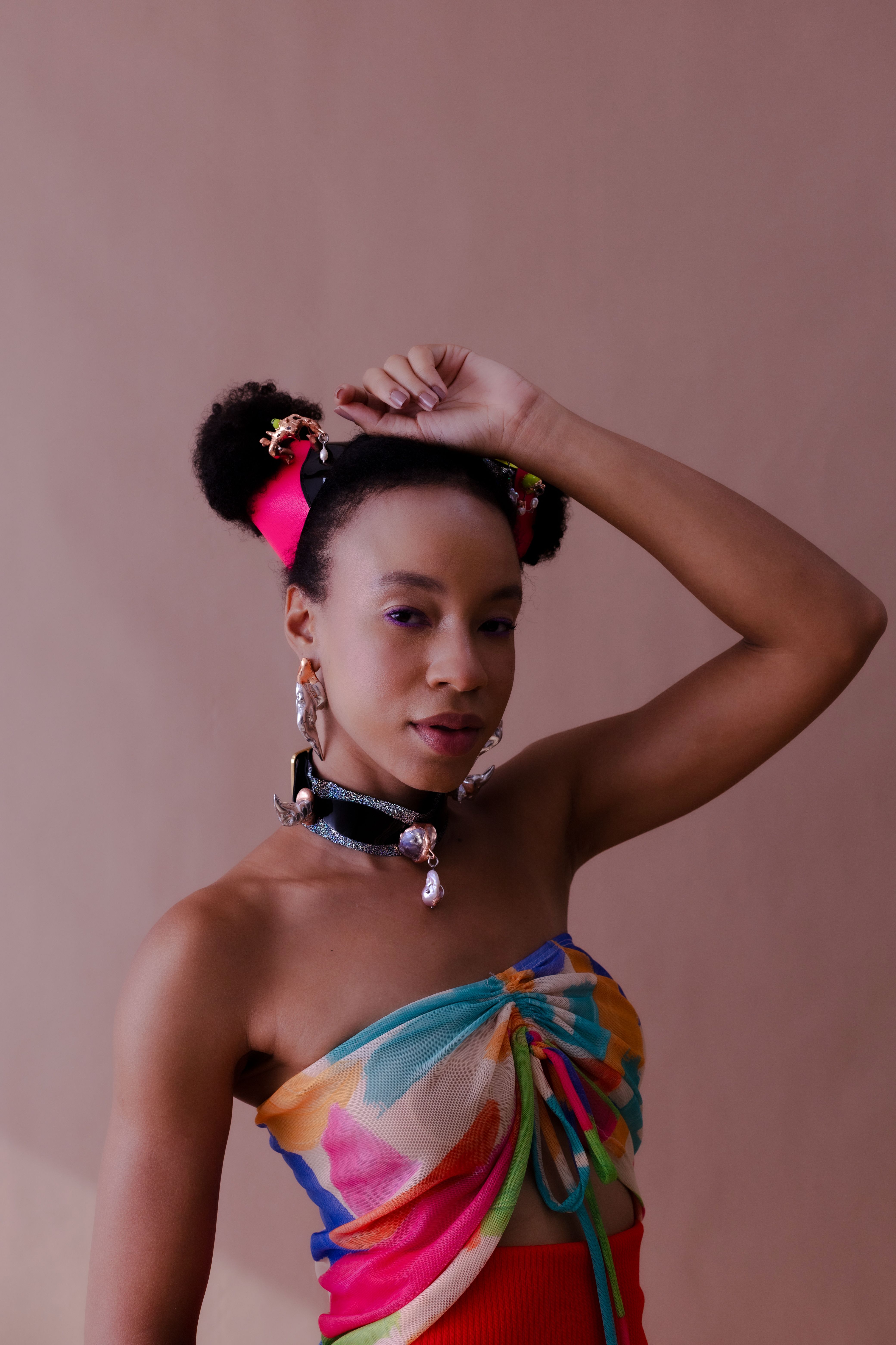 Vibrant Portrait of Woman in Colorful Attire · Free Stock Photo