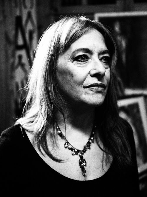 Free Elegant black and white portrait of a mature woman with jewelry, exuding grace and confidence. Stock Photo