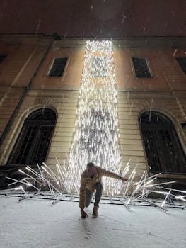 Captivating lighting installation amidst snowfall in Stockholm, perfect for winter themes.