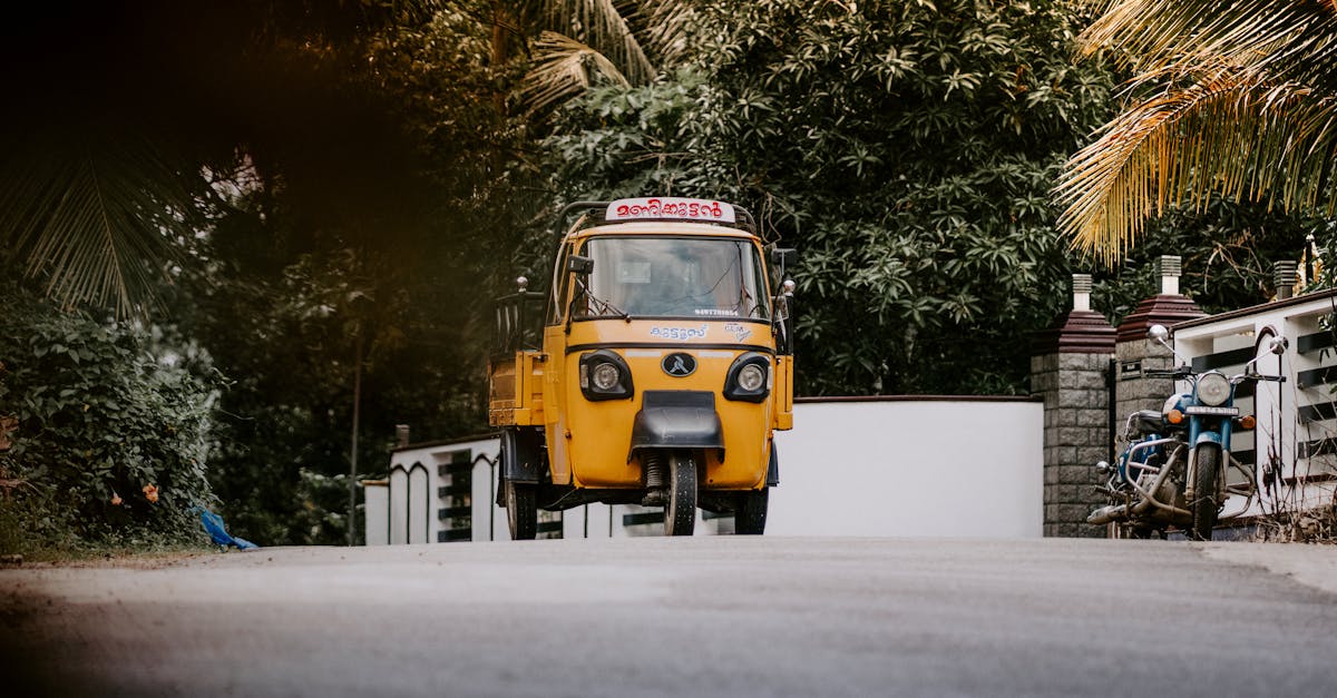 Bright Yellow Auto Rickshaw in Kerala Street · Free Stock Photo