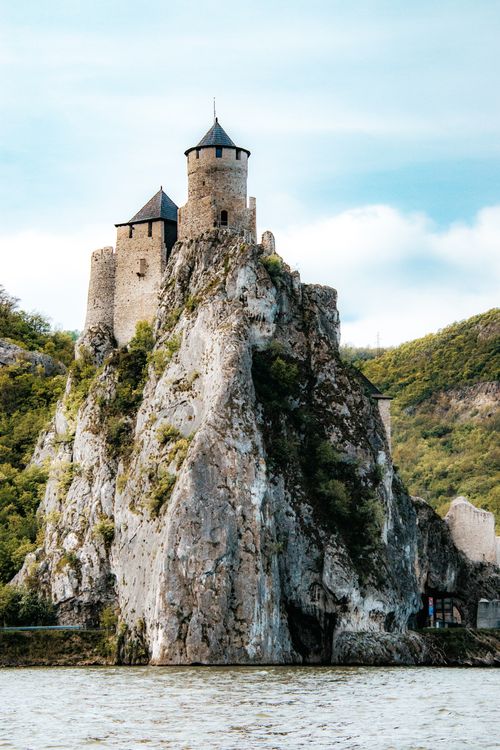 Free Stunning aerial view of Golubac Fortress on a rocky cliff by the Danube River in Serbia, showcasing medieval architecture. Stock Photo