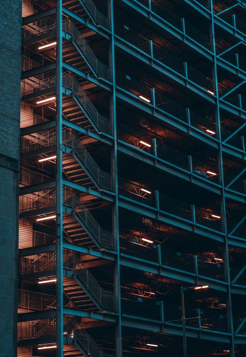 Free A dramatic view of urban architecture in Houston, Texas, captured at night with glowing lights. Stock Photo