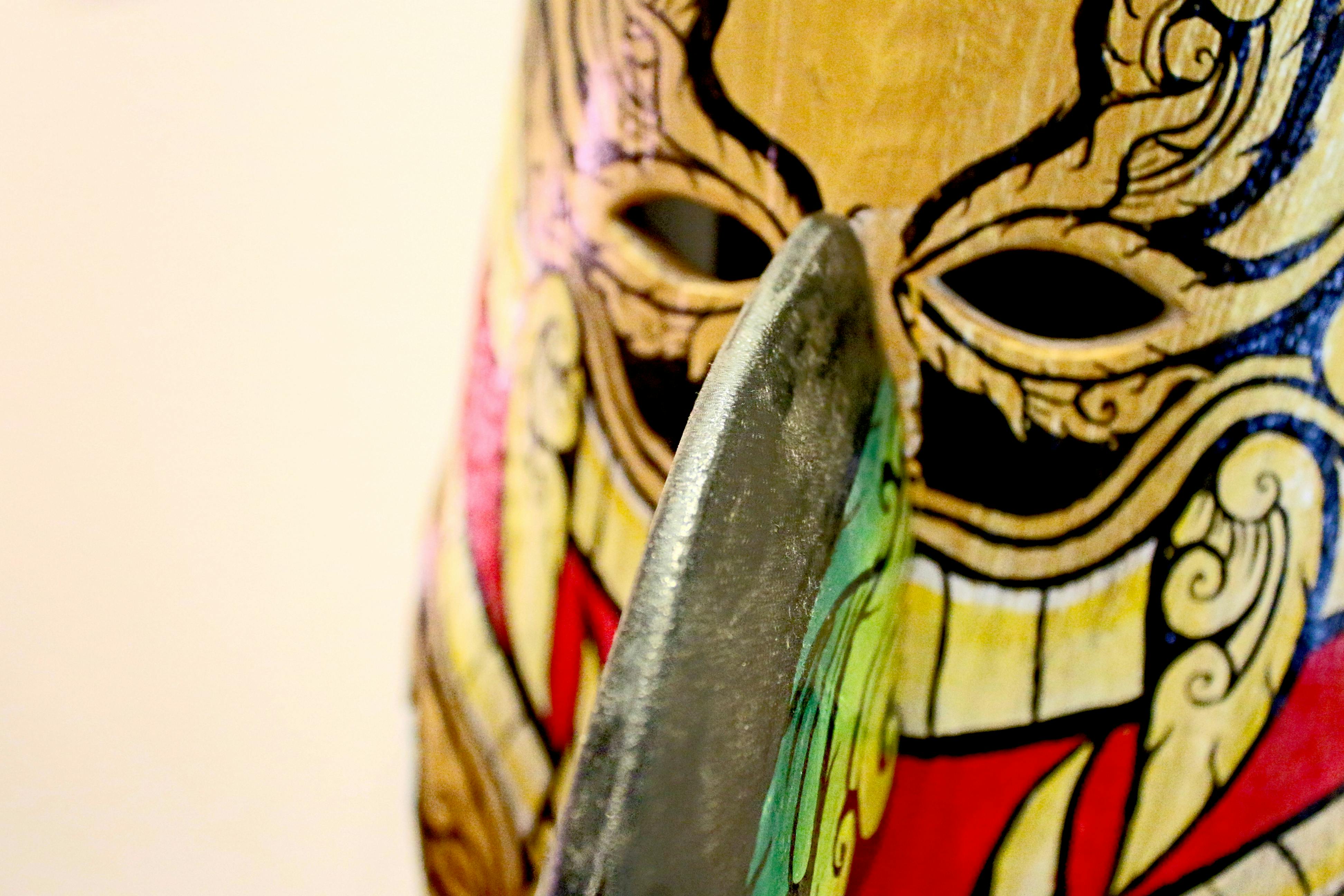 Free Vibrant and intricate close-up of a colorful artistic mask, showcasing unique design elements. Stock Photo