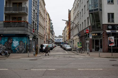 Free Street view in Hamburg showcasing buildings, pedestrians, and city life. Stock Photo