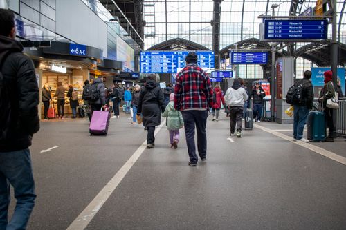 Travelers arriving at a Eurostar station in Europe