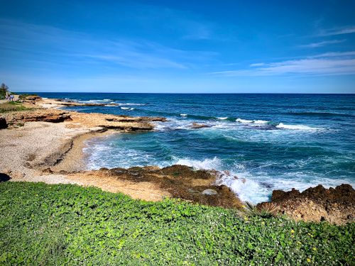 Free Explore the beautiful rocky coastline of Dénia, Spain, under a clear blue sky. Stock Photo