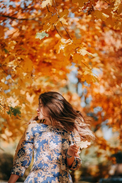 Photo of Woman Doing Hair Flip