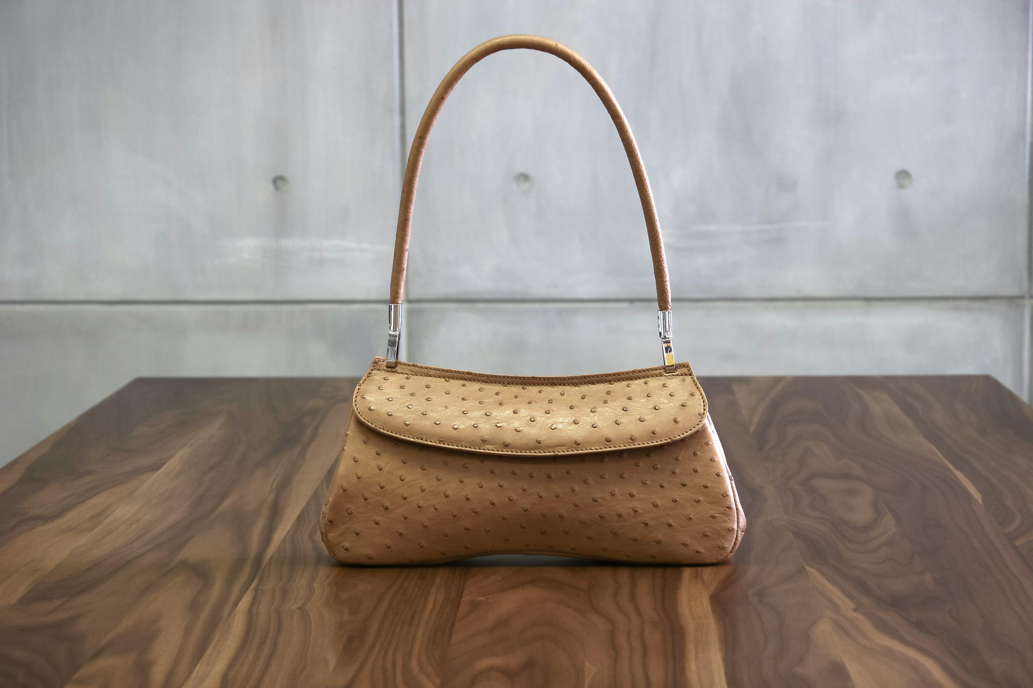 Stylish ostrich leather handbag perfect for fashion-forward individuals.