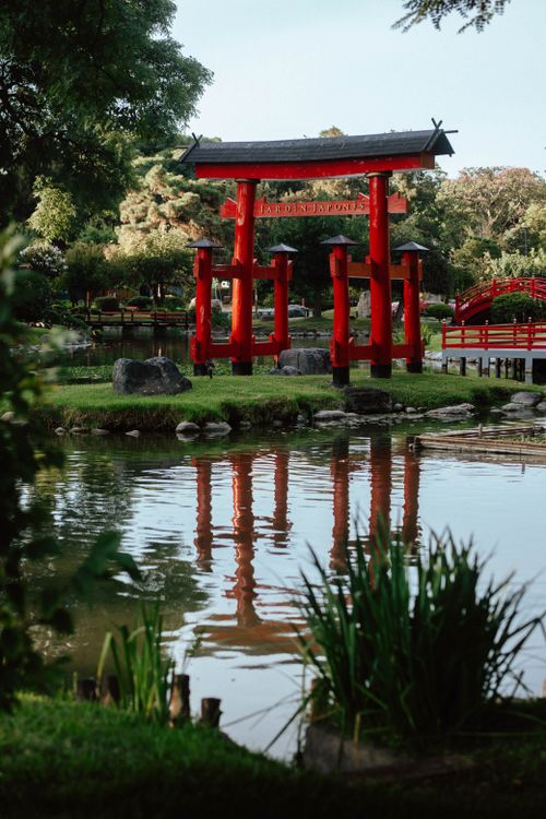 Free Serene view of a red Torii gate in a Japanese garden in Buenos Aires, Argentina. Stock Photo