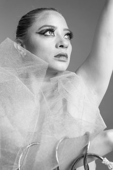 Striking black and white portrait of a ballet dancer in an artistic pose.