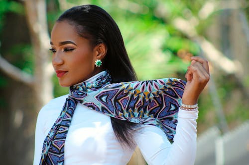 Shallow Focus Photo of Woman Wearing Scarf