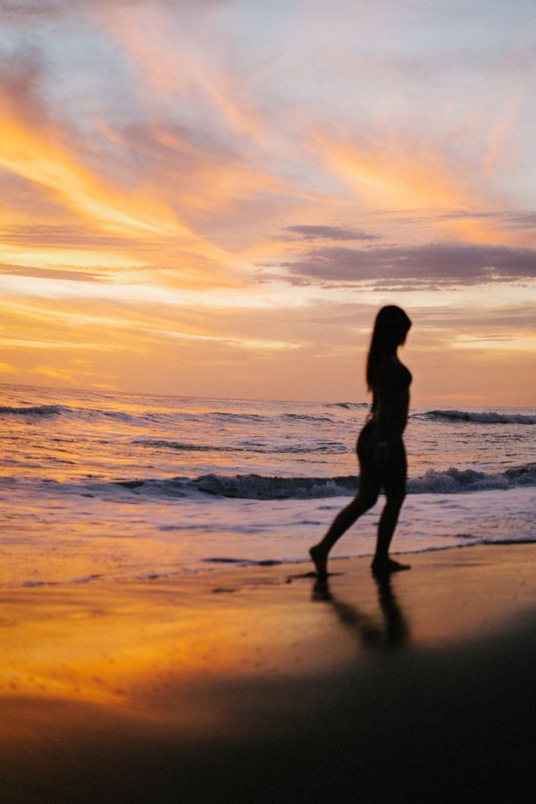 Woman at the Beach during Sunset · Free Stock Photo