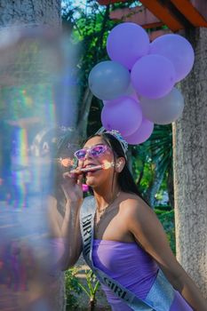Vibrant outdoor birthday celebration in Mexico City with colorful balloons.