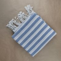 Cornflower stripe throw folded flat — photo by Karen Laårk Boshoff on Pexels