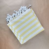 Beeswax stripe throw folded flat — photo by Karen Laårk Boshoff on Pexels