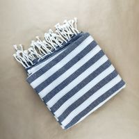 Slate stripe throw folded flat — photo by Karen Laårk Boshoff on Pexels