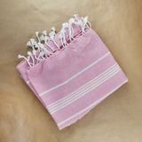 Rosehip stripe throw — photo by Karen Laårk Boshoff on Pexels