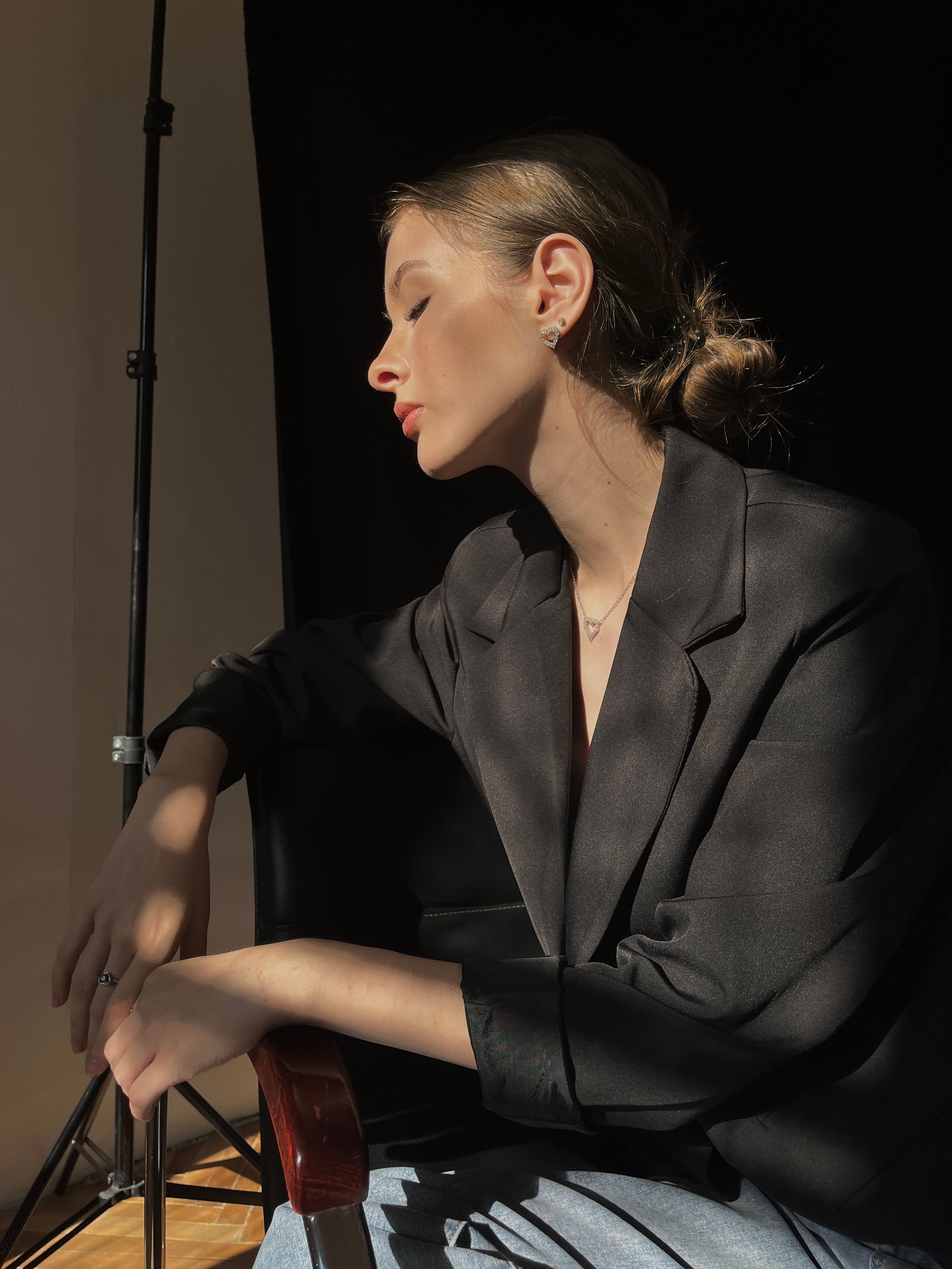 Elegant Portrait of a Woman in Dramatic Lighting · Free Stock Photo