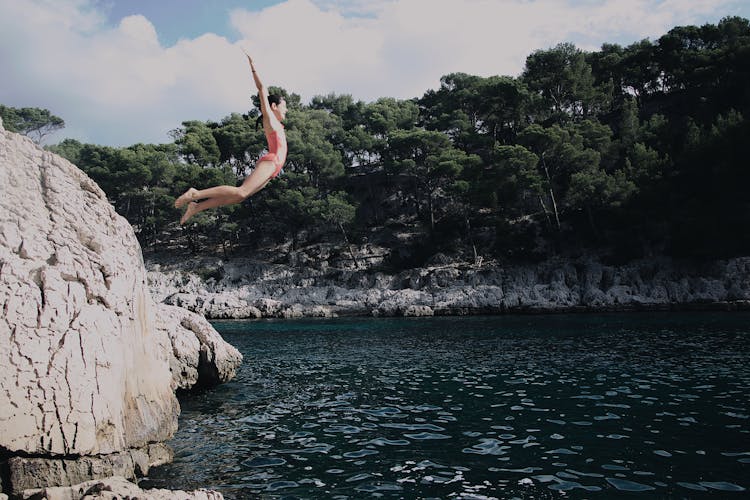 Person Jumping In To Water