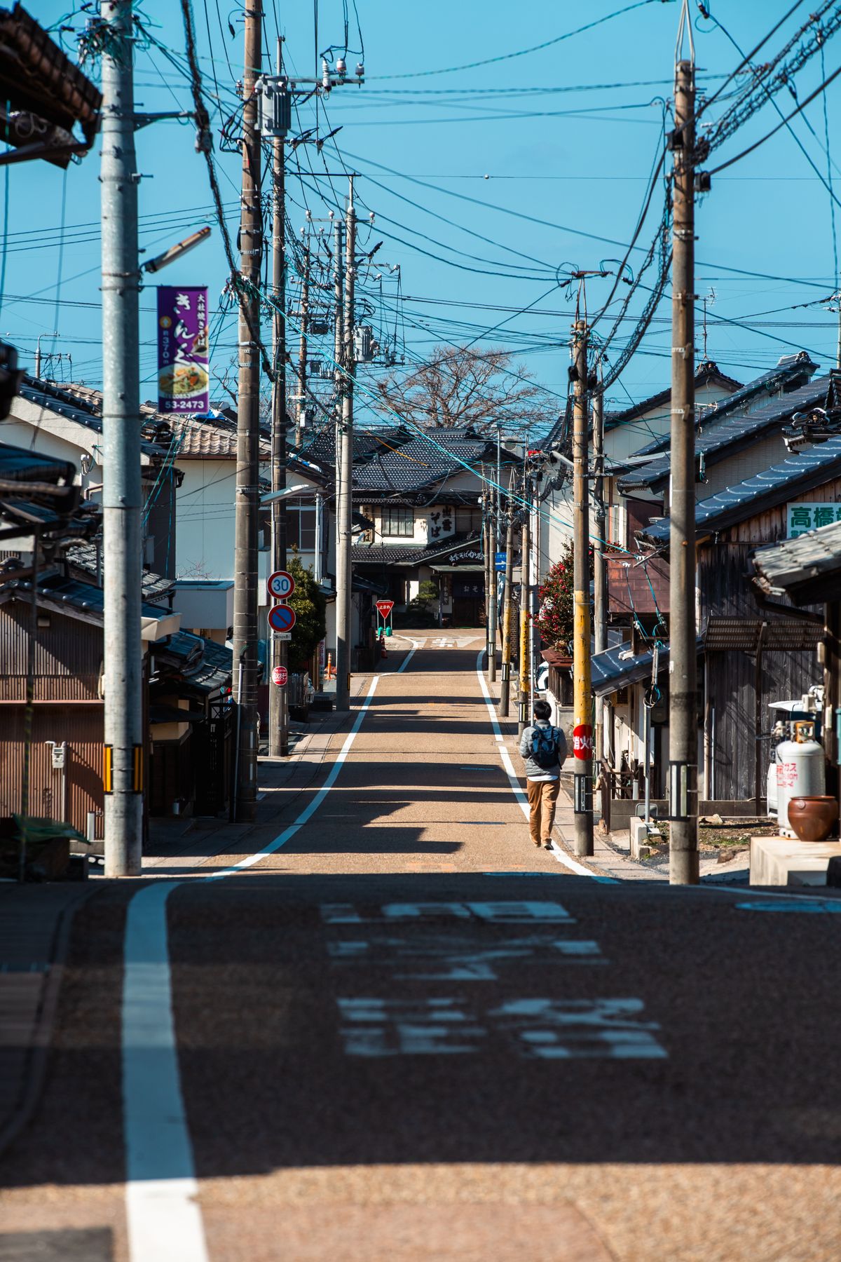 Traditional Japanese street with shops leading toward Izumo city in Shimane Prefecture