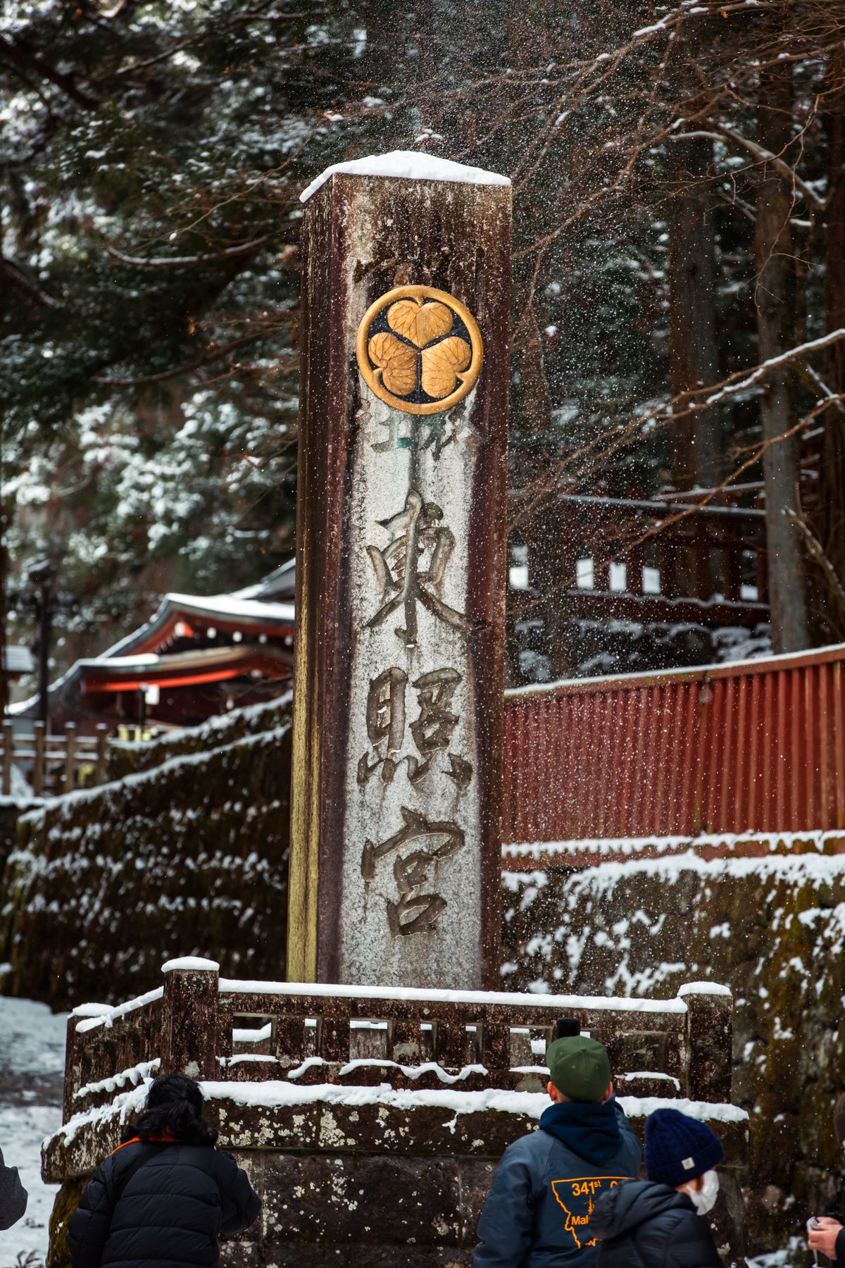 Visitors at Nikko Toshogu Shrine on a snowy day in Tochigi Prefecture