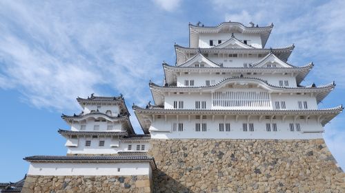 Free Stunning view of Himeji Castle's traditional architecture against a clear blue sky in Japan. Stock Photo