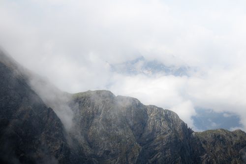 Free Explore the misty peaks of the Austrian Alps in Tirol, captured in serene daylight. Stock Photo