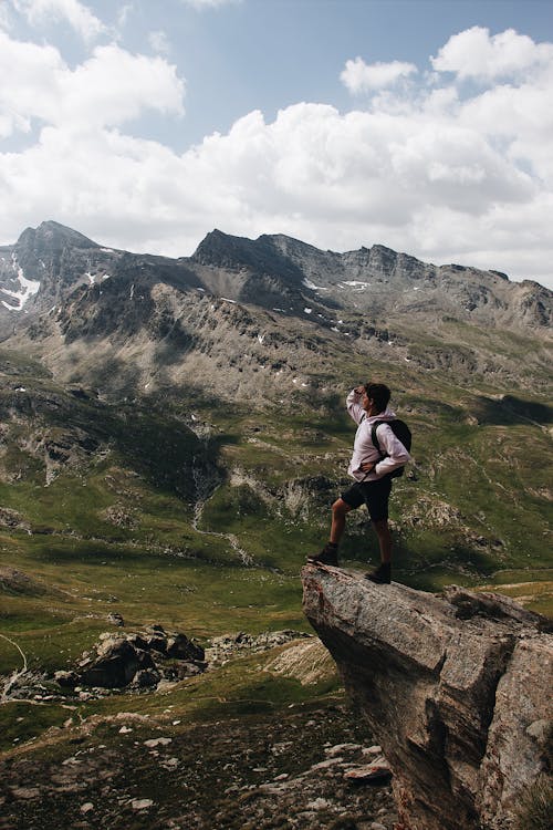 Man Standing On Rock 