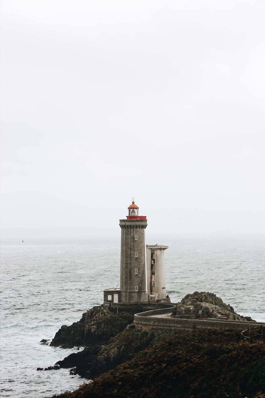debut novel cover, lighthouse and sea