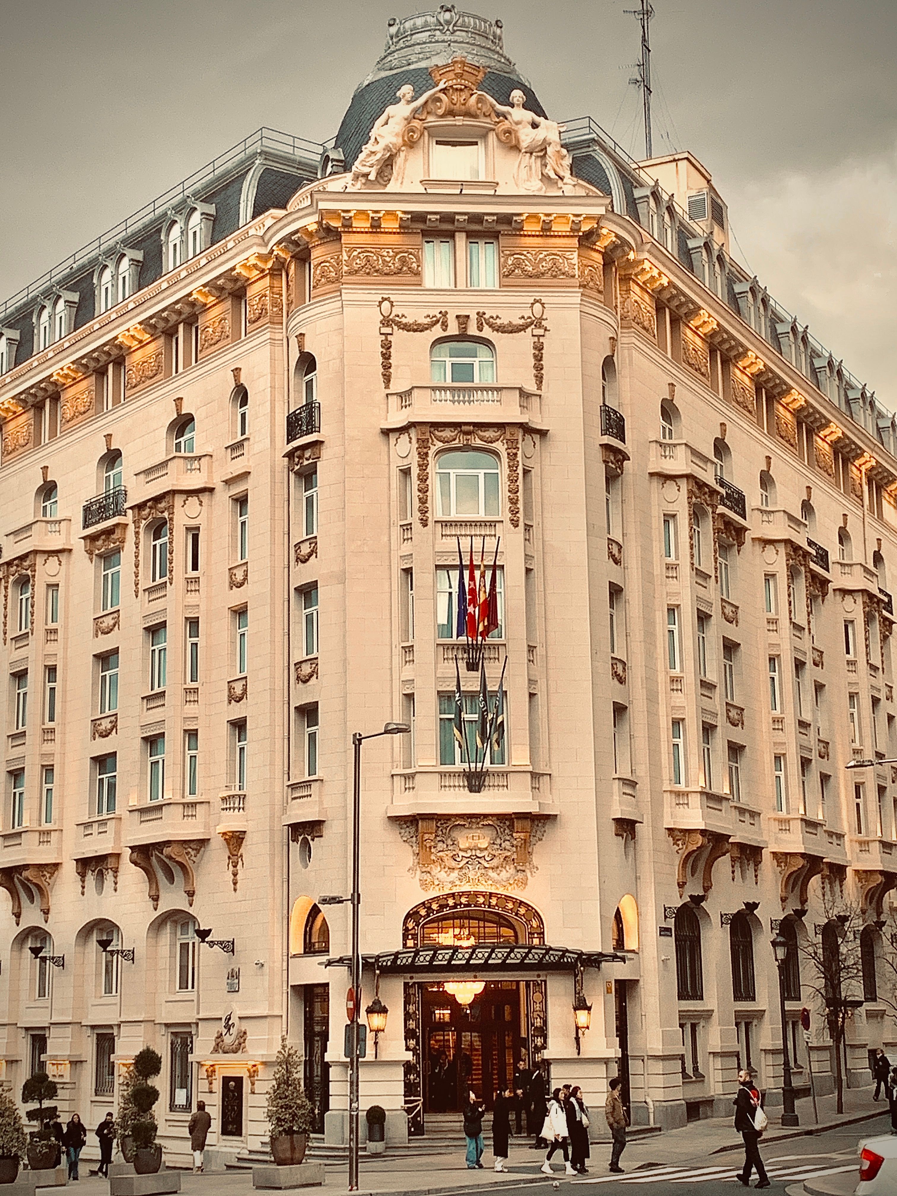 Historic European Hotel Building at Dusk · Free Stock Photo