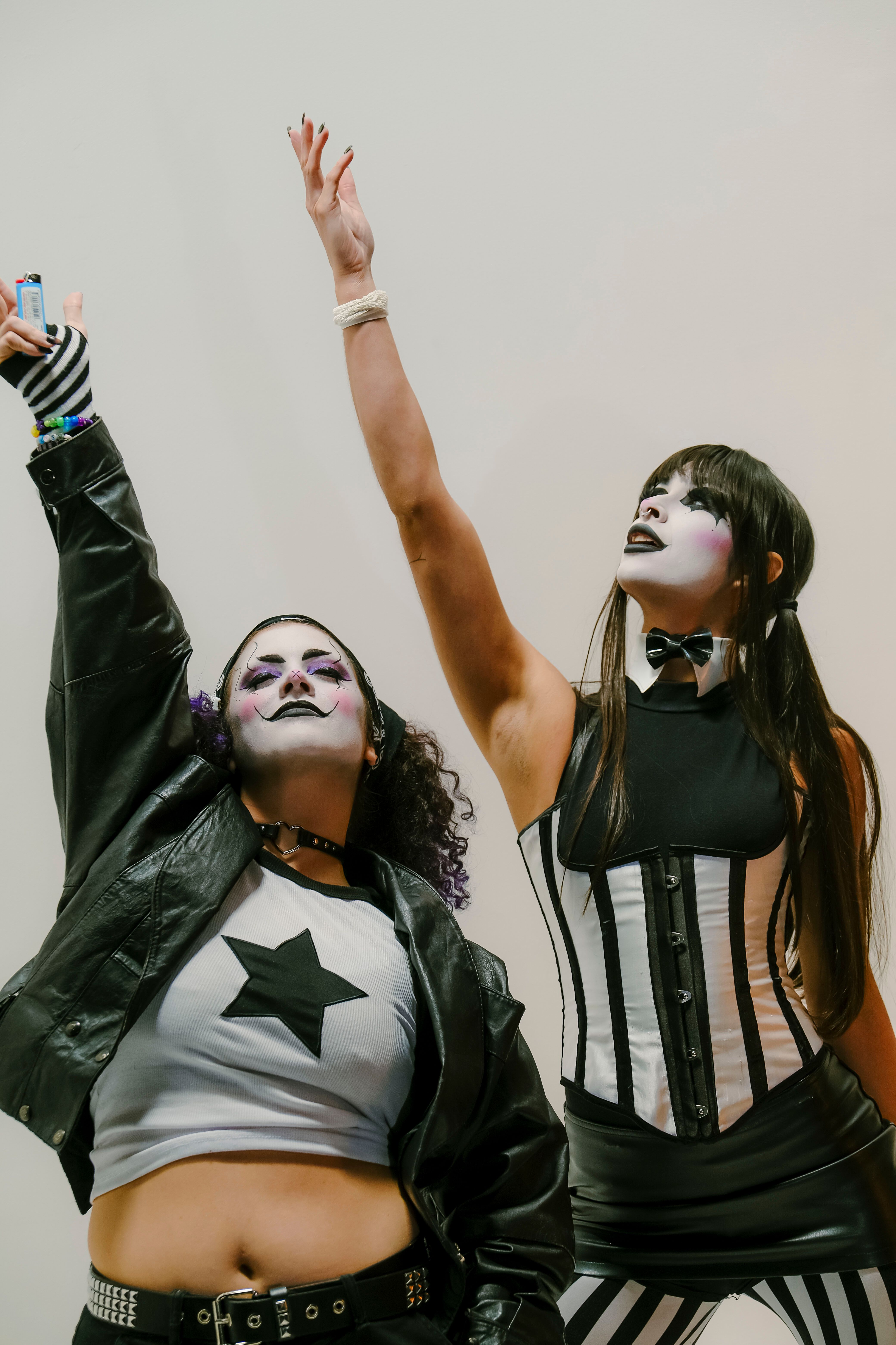 Dynamic Performance with Theatrical Makeup and Costume · Free Stock Photo
