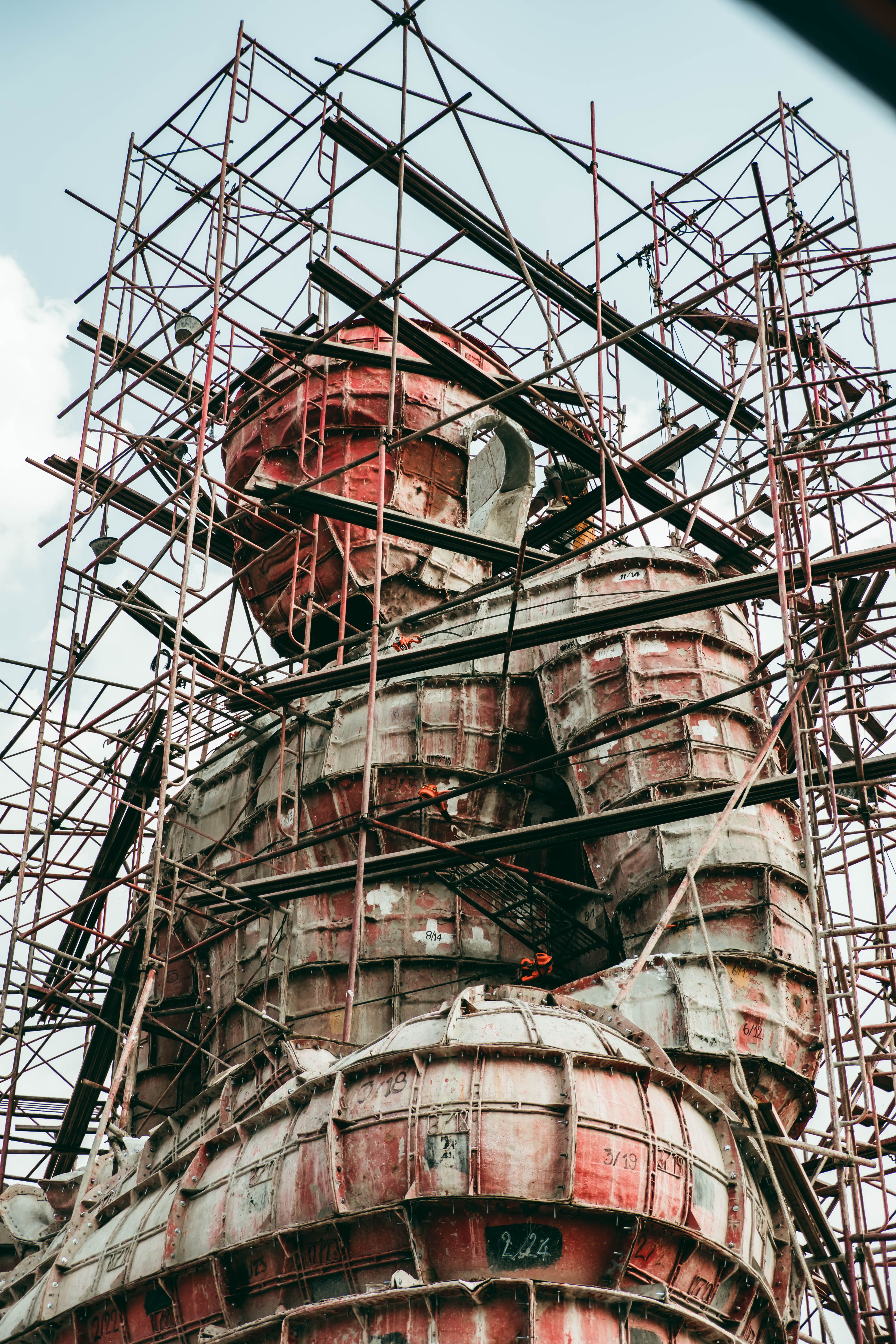 Giant Statue Undergoes Restoration with Scaffolding · Free Stock Photo