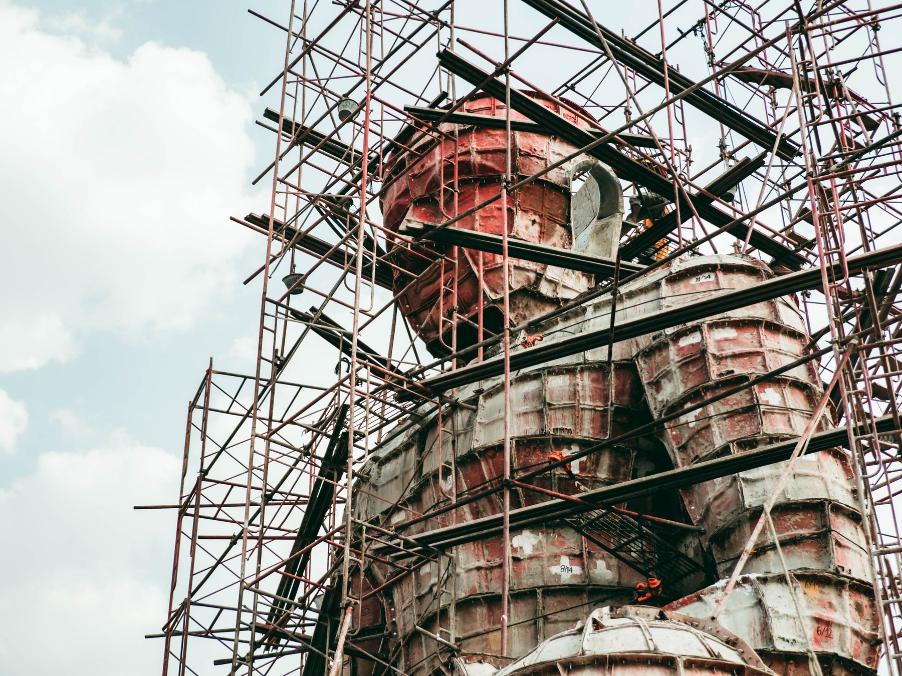 Exterior Painting in Ham — a decorator at work mid-project