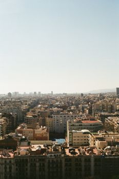 Discover the sprawling cityscape of Barcelona with this panoramic urban view, showcasing classic architecture.