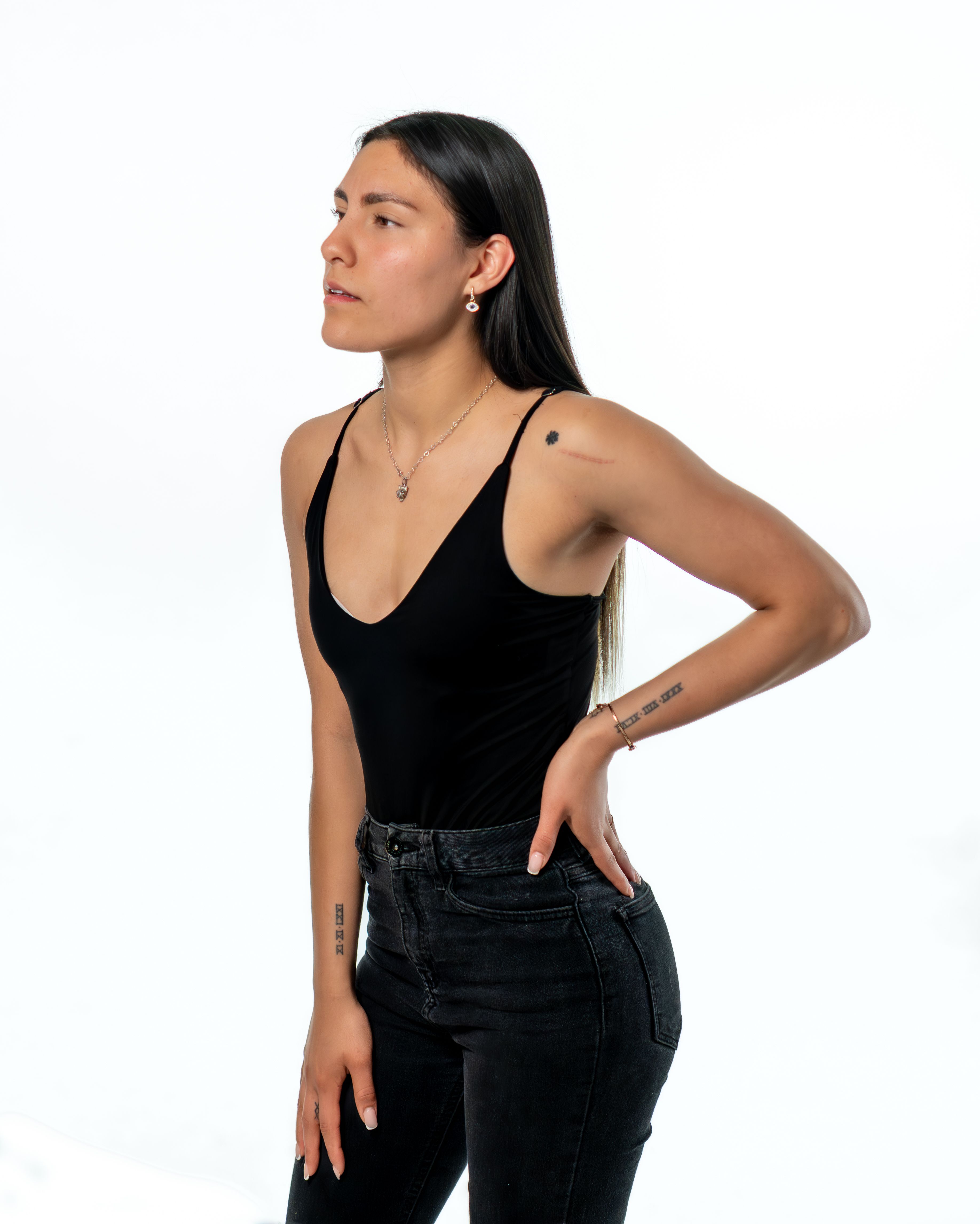 Stylish Portrait of a Young Woman in Black Attire · Free Stock Photo