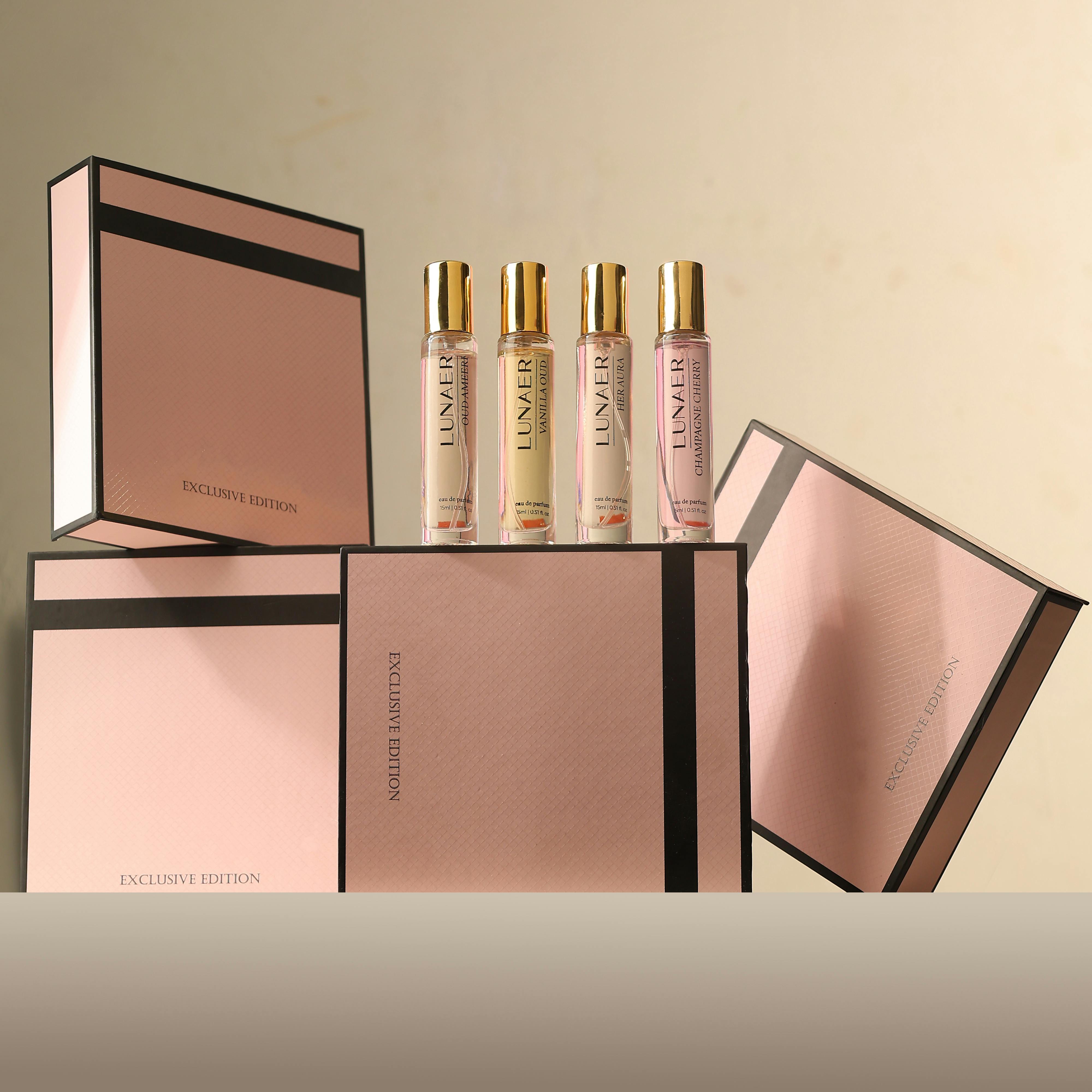 Sophisticated display of luxury perfume bottles with gift boxes, ideal for special occasions.