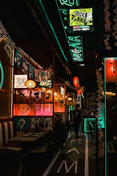 Explore the neon-lit interior of a futuristic ramen restaurant in Tokyo, Japan, with a cyberpunk ambiance.